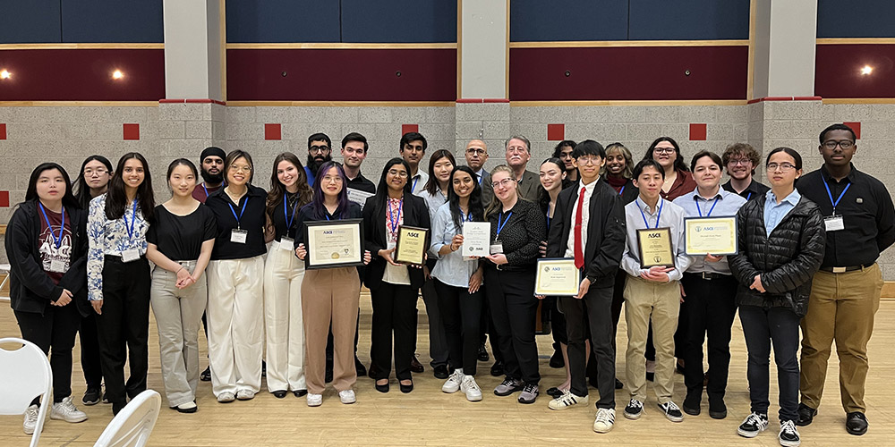A professor with a large group of students