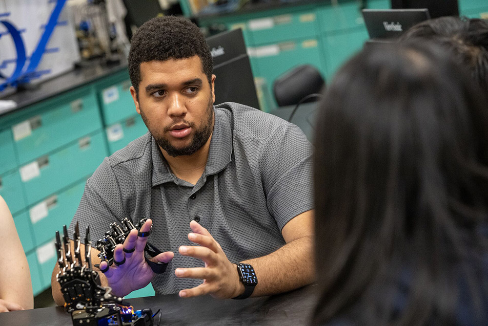 An instructor explaining technology