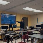 An alumni presenting to a class