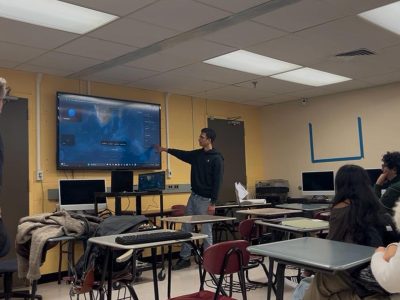 An alumni presenting to a class